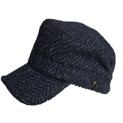 Cadet style cap made from Kerry Woollen Mil;ls tweed. Charcoal Grey herringbone pattern in Donegal tweed fabric weight. From wool fleece to tweed at Kerry Woollen Mills