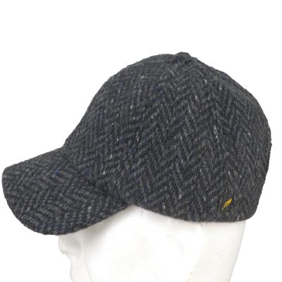 Irish tweed baseball cap spun and woven in Kerry Ireland. Herringbone pattern CH23-01 of charcoal and mid grey.