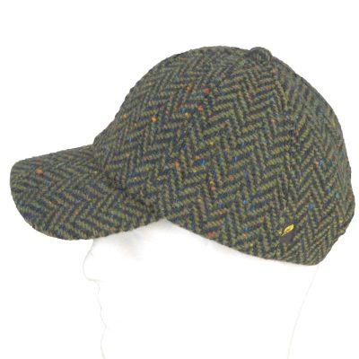Irish tweed baseball cap spun and woven in Kerry Ireland. Herringbone pattern 44A of turf and green.