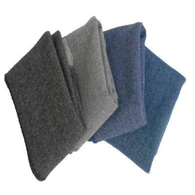 soft lambswool scarf in classic herringbone design. Lite grey warp