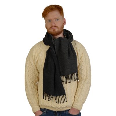 double sided wool scarf with charcoal on one side and black on the other . 5cm fringes on both ends.