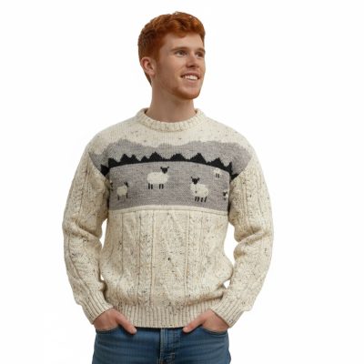 Aran wool sweater with sheep in field knit across chest area. Cute and warm